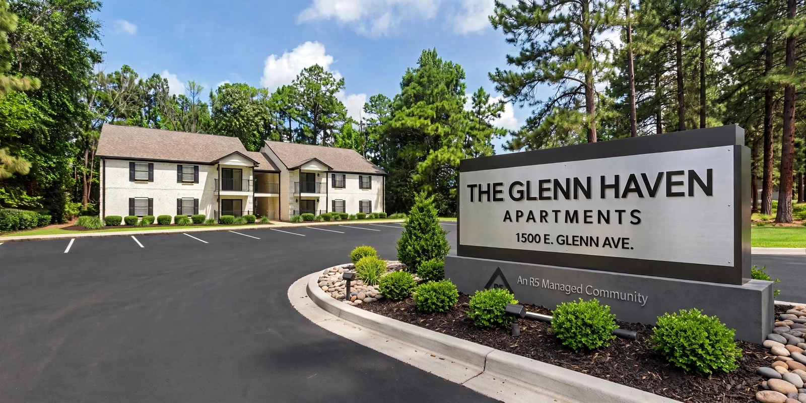 The Glenn Haven Apartments entrance sign and renovated building exterior